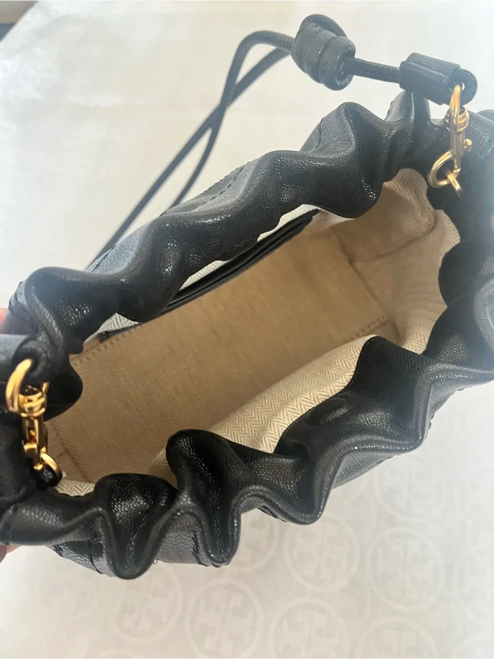 Tory Burch Black Quilted Drawstring Shoulder bag  with Gold Logo